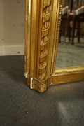 Louis XVI style gilded mirror Around 1900