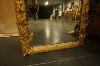 Mirror in gilded wood with plaster, France 19th century