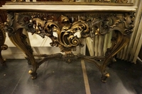 Mirror top console table in gilded wood, Italy first half 20th C.