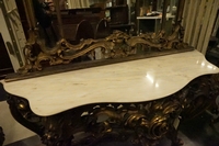 Mirror top console table in gilded wood, Italy first half 20th C.