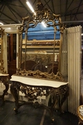 Mirror top console table in gilded wood, Italy first half 20th C.