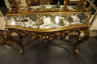 Mirror top console table in gilded wood, Italy first half 20th C.