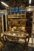 Mirror top console table in gilded wood, Italy first half 20th C.