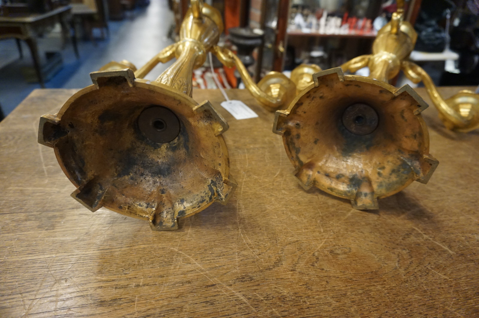 Pair of bronze gilded candleholders