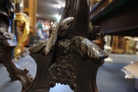 Pair of carved pedestals in walnut, Italy 19th C.