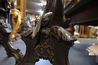 Pair of carved pedestals in walnut, Italy 19th C.