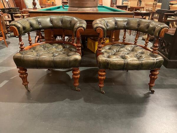 Pair of Victorian leather upholstered oak desk chairs