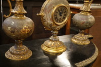 Pottery with brass Gustav Becker clock set 19th Century