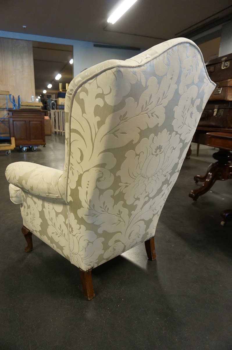 Queen Ann style wingback armchair