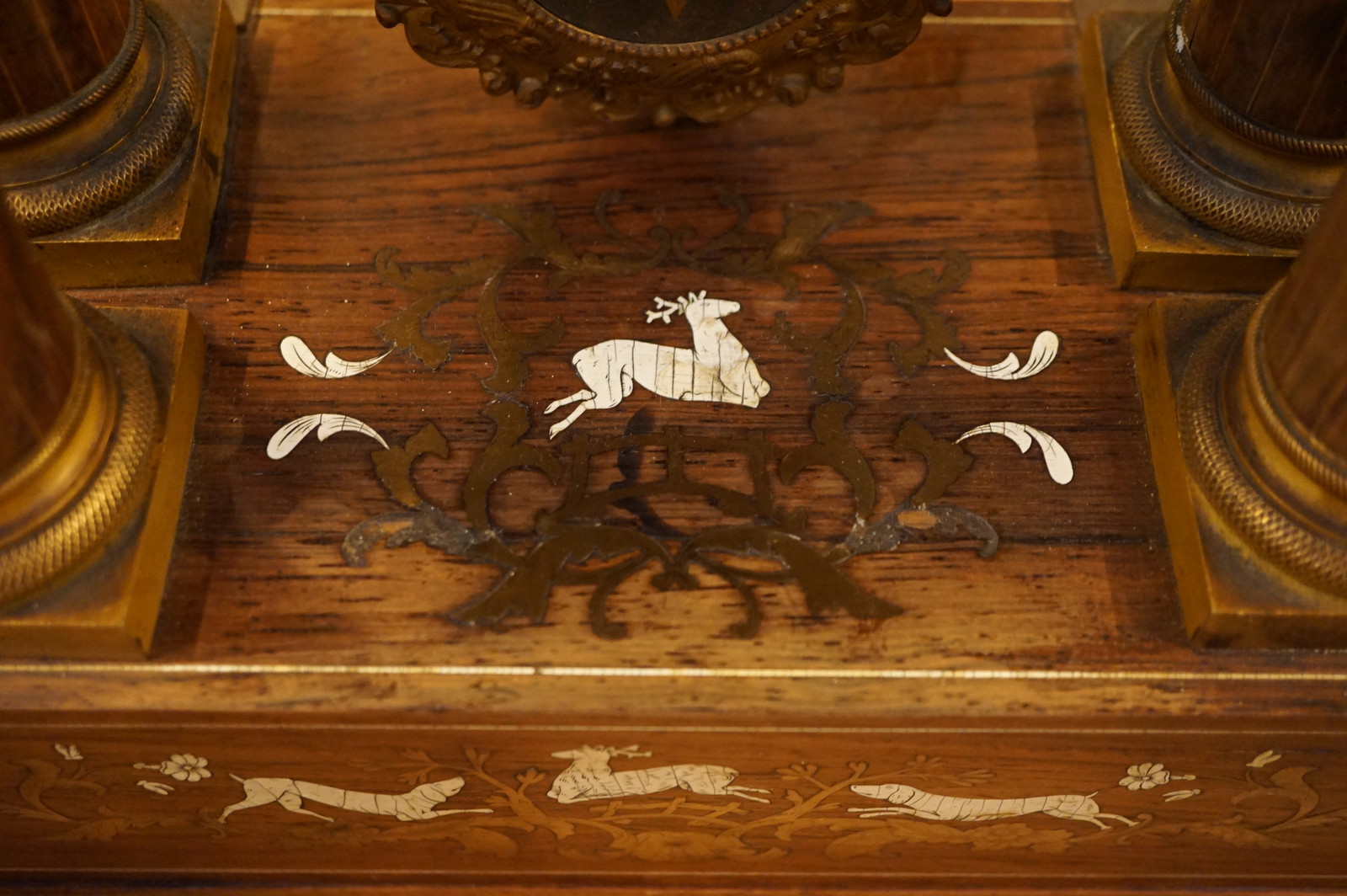 Rosewood portico clock with marquetry