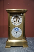 Table clock in Glass and gilded bronze , France 19th C.