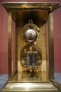 Table clock in Glass and gilded bronze , France 19th C.