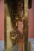 Table clock in Glass and gilded bronze , France 19th C.
