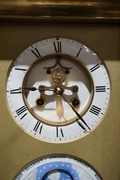 Table clock in Glass and gilded bronze , France 19th C.